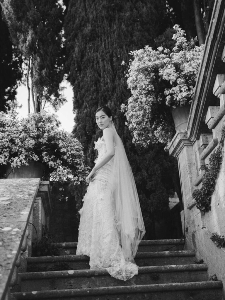 La Foce wedding, bride walking up the stairs